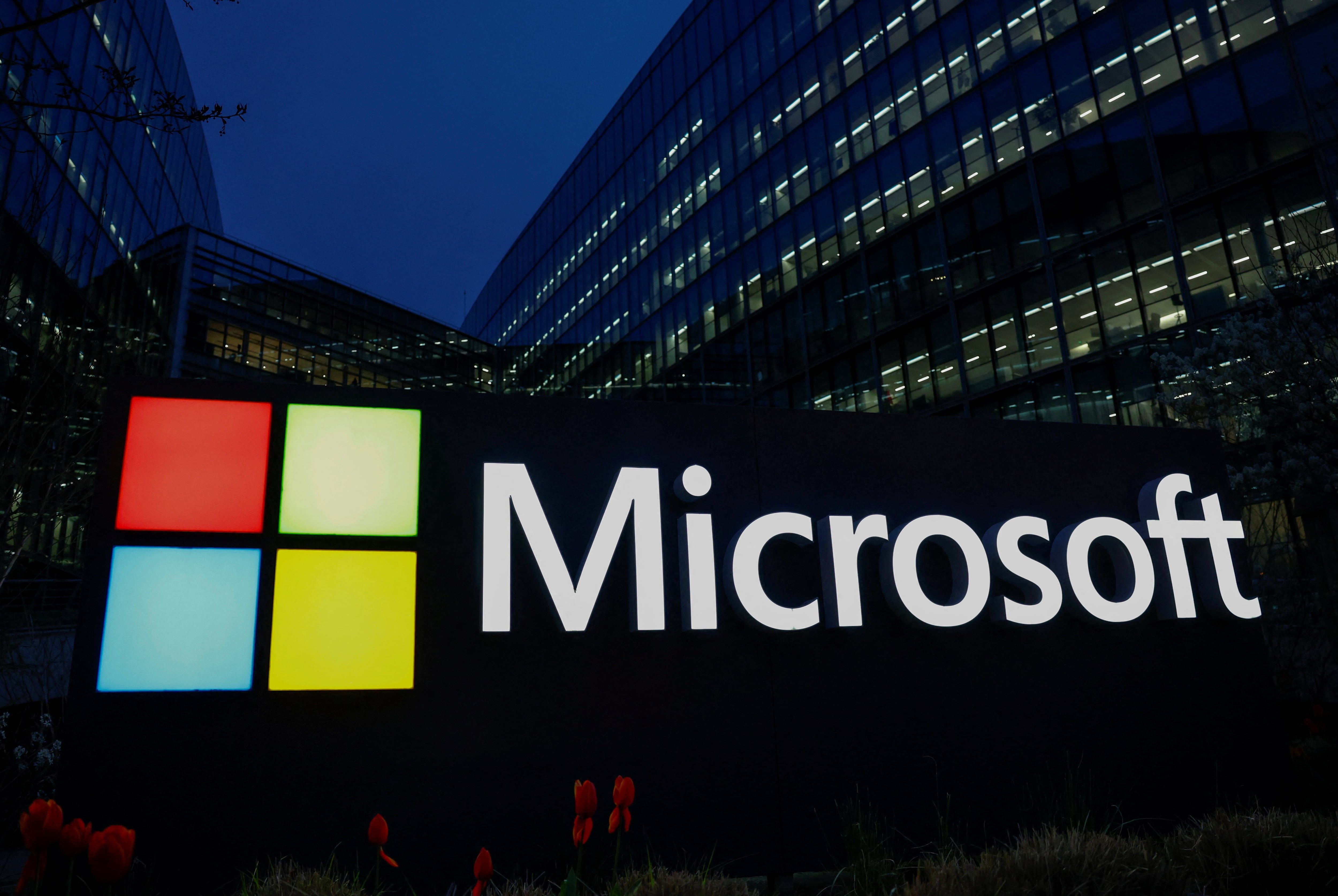 A view shows a Microsoft logo at Microsoft offices in Issy-les-Moulineaux near Paris, France, March 25, 2024. REUTERS/Gonzalo Fuentes