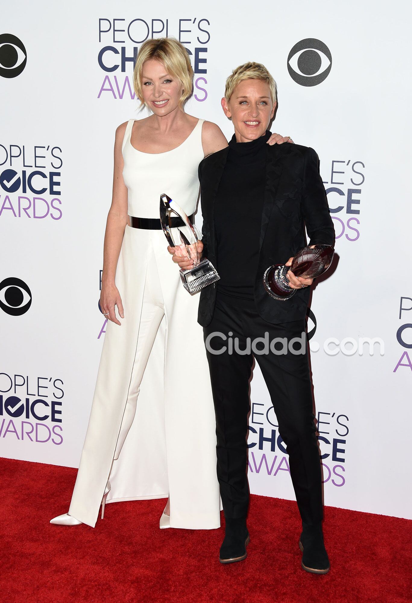 Ellen Degeneres y su novia, Portia de Rossi en la red carpet (Fotos: AFP). 