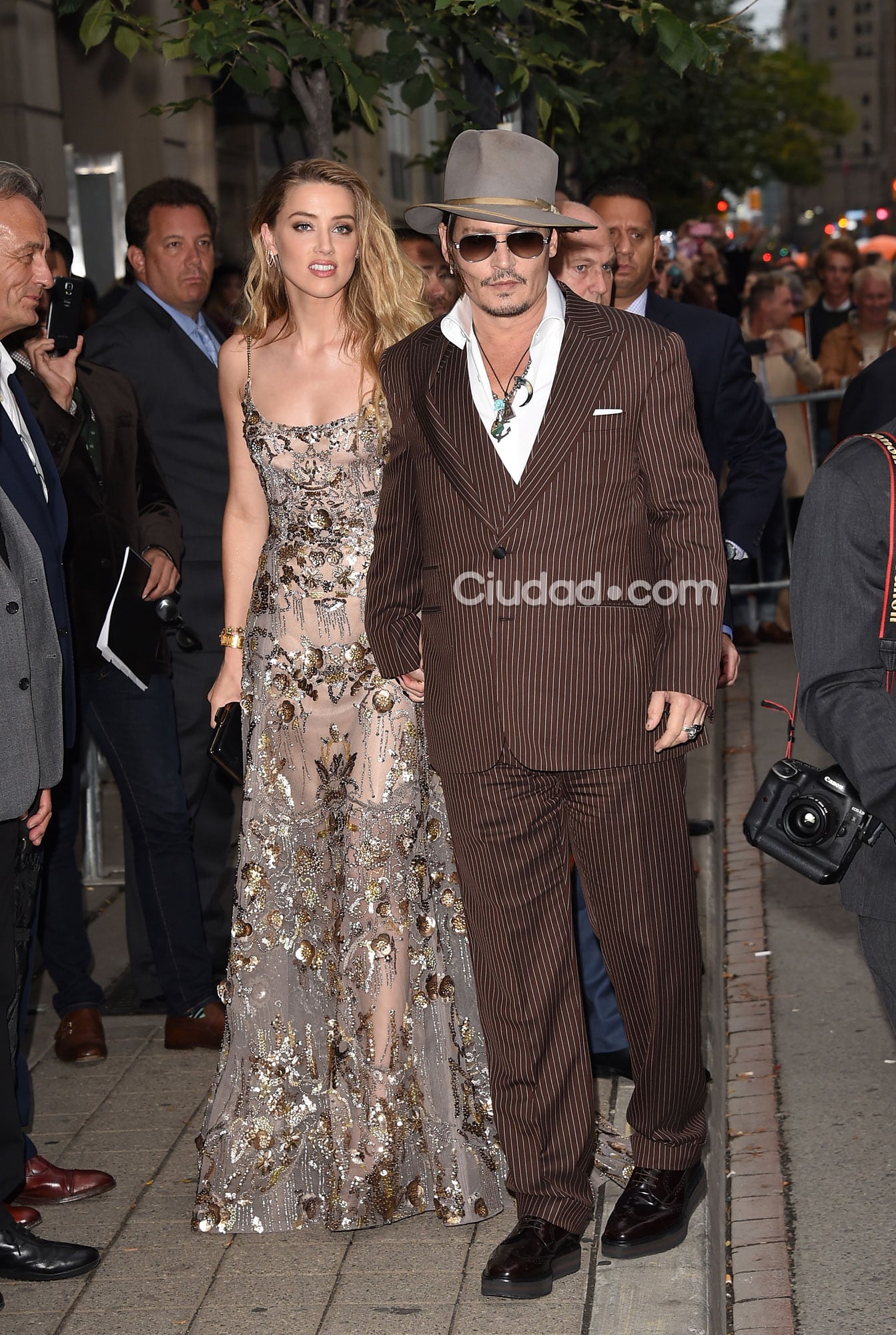 Johnny Depp y su bellísima esposa, Amber Heard (Fotos: AFP).