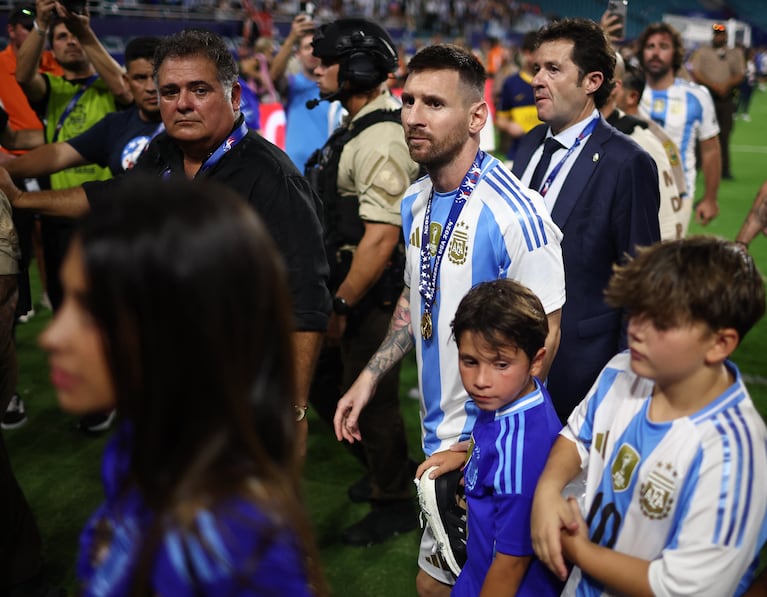 Soccer Football - Copa America 2024 - Final - Argentina v Colombia - Hard Rock Stadium, Miami, Florida, United States - July 15, 2024 Argentina's Lionel Messi with his family after winning the Copa America 2024 REUTERS/Agustin Marcarian